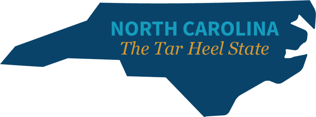 Silhouette of the state of North Carolina with "North Carolina" written inside, above the words "The Tar Heel State"